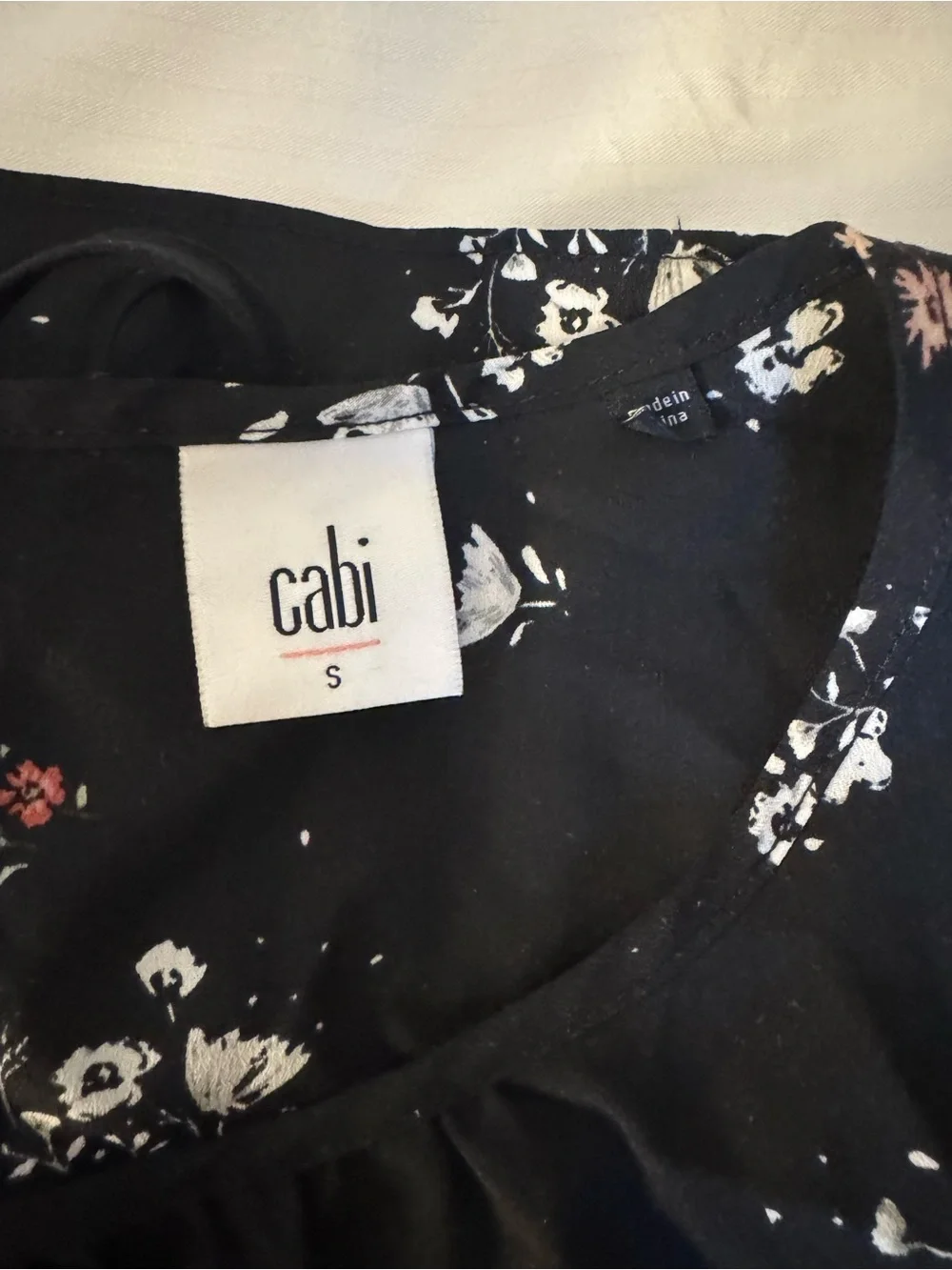 CAbi Black Floral Sleeveless women’s blouse with White and Pink Blossoms - Picture 2 of 4